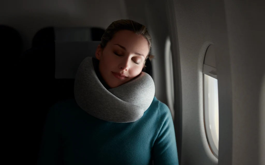 Airline passenger red eye neighbor slapping wakeup